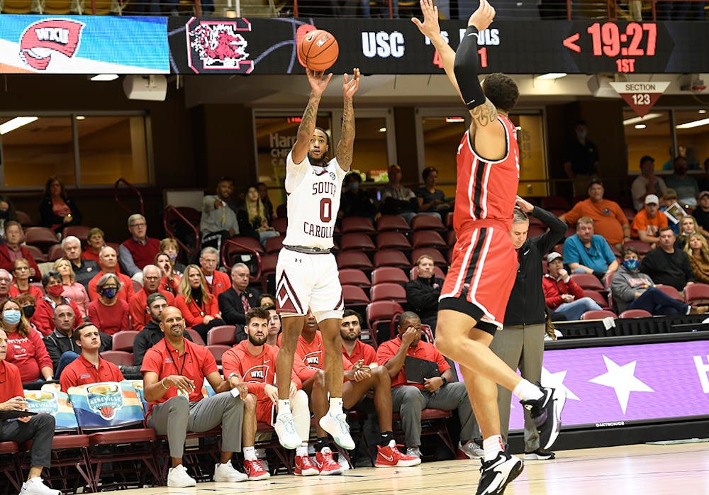 <p>Graduate student guard James Reese V shoots the ball. The Gamecocks won over Western Kentucky 75-64 on Sunday, Nov. 14, 2021.</p>