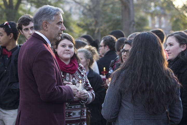 Hundreds of people gathered at the Horseshoe Friday evening to remember Prof. Raja Fayad who was shot to death by his ex-wife, Sunghee Kwon, the day before in the Arnold Public Health Research Center. 