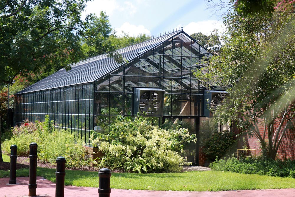 <p>The University Greenhouse sits behind the University President's House on Aug. 20, 2024. The greenhouse houses a variety of plants and is mainly used to grow potted plants for events around campus.</p>