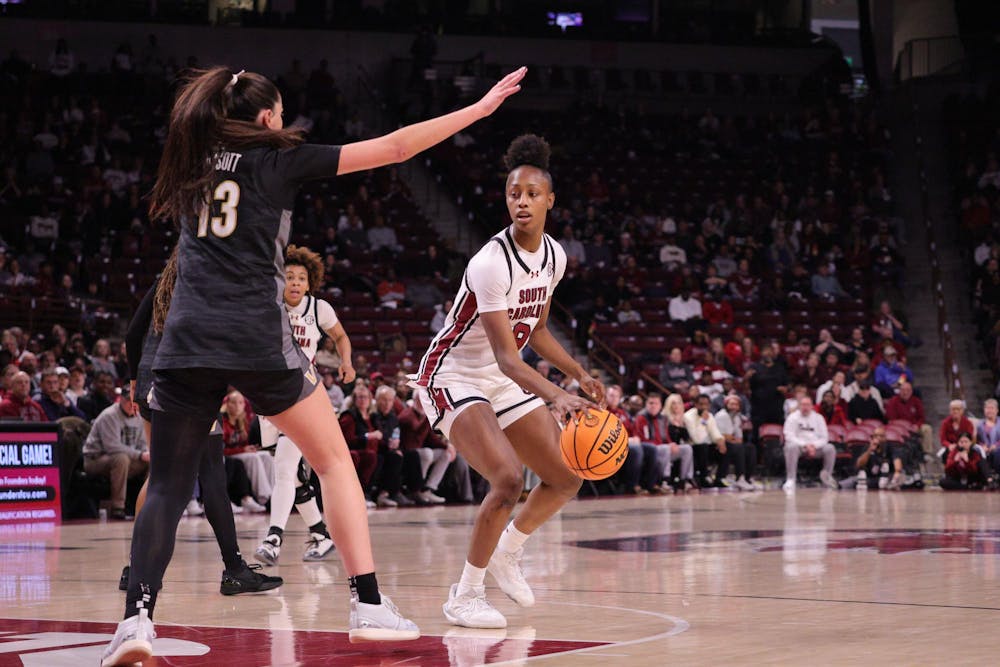 <p>FILE — Sophomore forward Joyce Edwards holds the ball during the Gamecocks’ matchup with Vanderbilt at Colonial Life Arena on Jan. 25. She looks for an open teammate as a defender steps in front of her.</p>