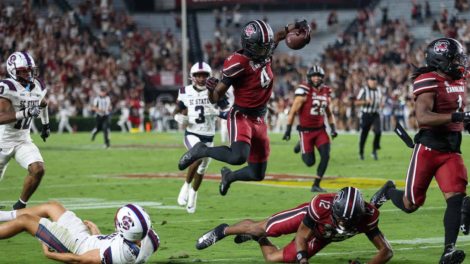 After an initial rain delay, the game between the USC Gamecocks and SC State Bulldogs was underway. After a slow offensive start, the Gamecocks triumphed over the Bulldogs 38-10.