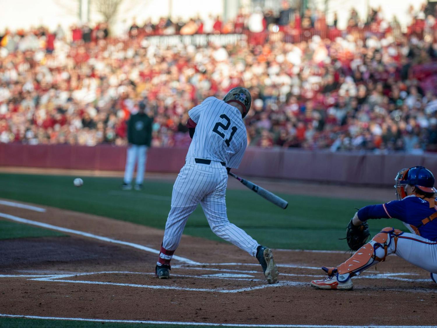Sophomore outfielder Ryan Bakes hits the ball of a Clemson pitcher on March 2, 2025. The Gamecocks recorded 5 hits on the night against the Tiger defense.