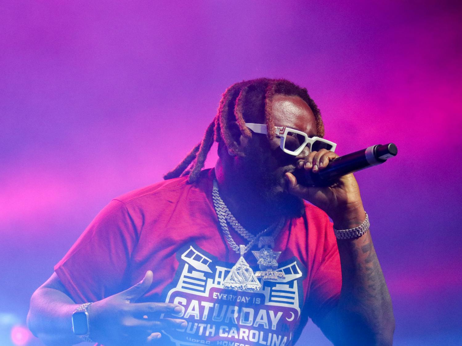 T-Pain performing at Cockstock on Oct. 21, 2022. His performance featured vivid lights and a larger-than-life stage presence that kept the audience engaged.&nbsp;