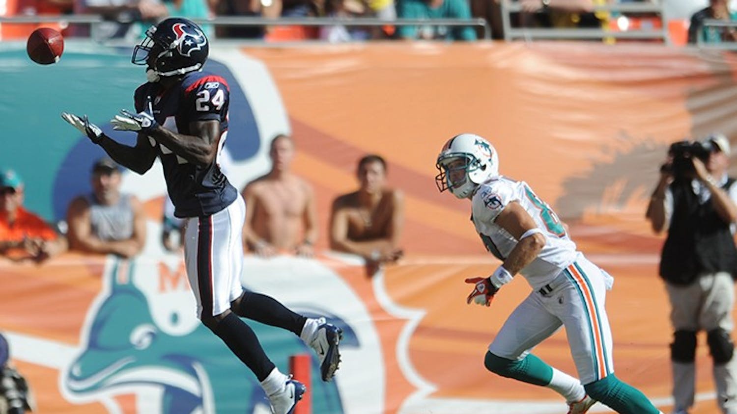 Jonathan Joseph of the Texans intercepts a pass intended for Brian Hartline of the Dolphins. The Houston Texans defeated the Miami Dolphins, 23-13, at Sun Life Stadium in Miami Gardens, Florida, Sunday, September 18, 2011. (Jim Rassol/Sun Sentinel/MCT)
