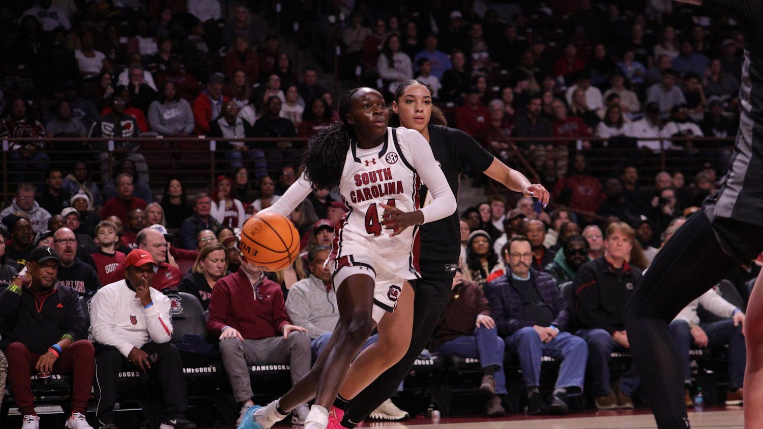 Freshman guard Agot Makeer dribbles toward the basket during the Gamecocks’ matchup with Vanderbilt at Colonial Life Arena on Jan. 25. She moves past a defender as she drives in for a shot.