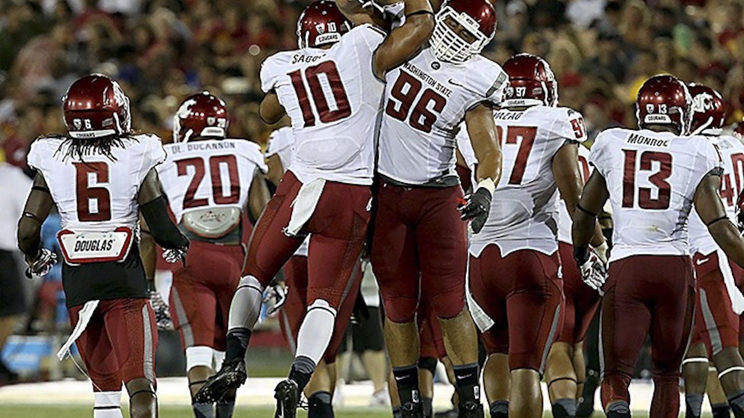 Washington State defenders Justin Sagote (10) and Xavier Cooper (96) celebrate after blocking a field goal attempt by USC&apos;s Andrew Furney in the third quarter at the Los Angeles Coliseum on Saturday, September 7, 2013, in Los Angeles, California. (Luis Sinco/Los Angeles Times/MCT)