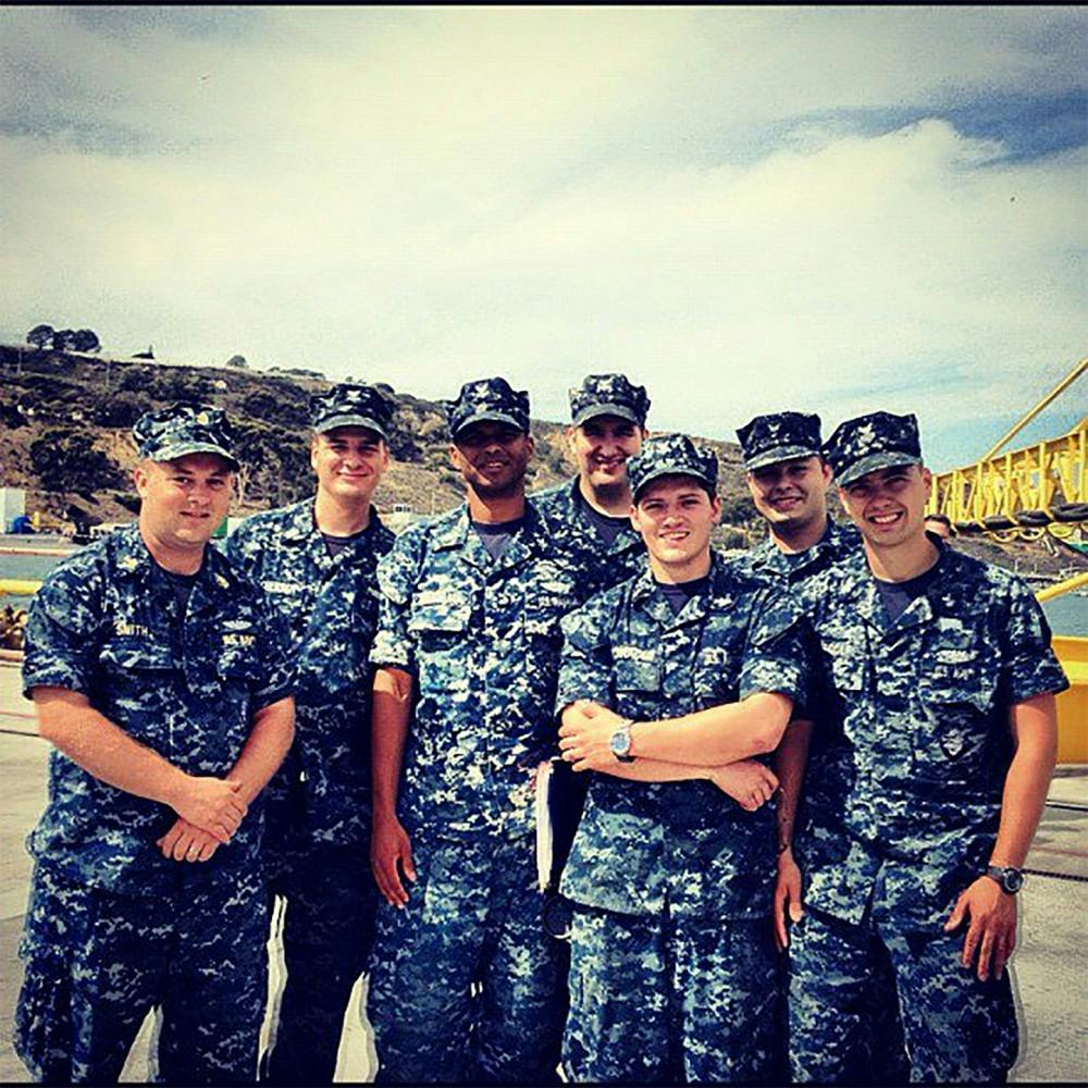 <p>"Christopher Lorensen (second from the left) served six years in the Navy."</p>