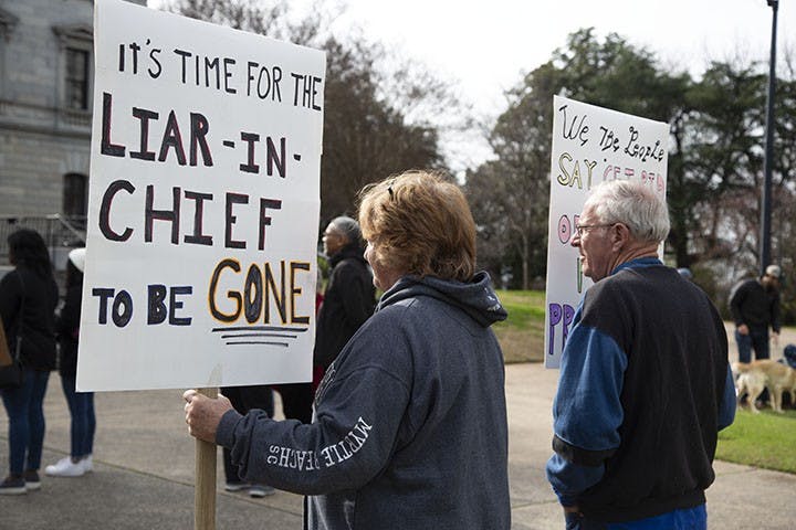 Joan Sorenson, Retired
The couple from East Over, South Carolina, attended the Women’s March holding signs that showed their opinions on President Trump. Mrs. and Mr. Sorenson believe President Trump is a liar and a phony, as stated on their signs.