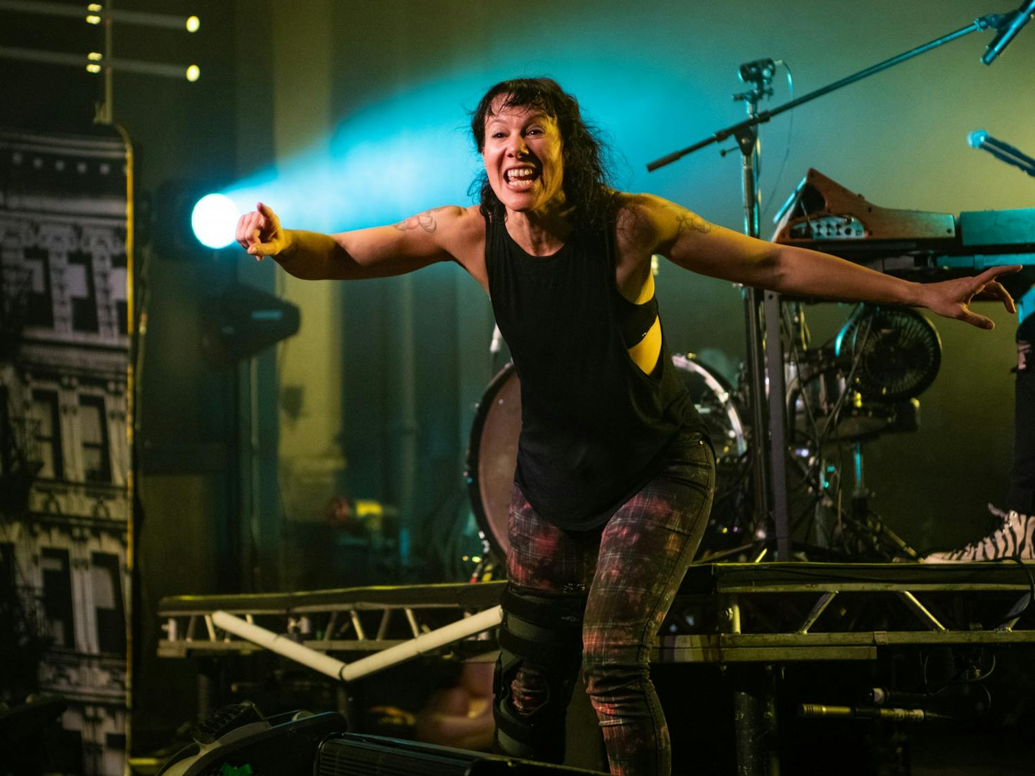 Kim Schifino points at a fan and lip syncs at the November Matt and Kim concert in Columbia. The pair plays tracks between songs where they interact with the crowd.