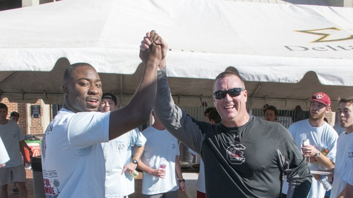 Former star running back Marcus Lattimore and Interim Head Coach Shawn Elliot came together to support Lattimore's foundation as a part of this year's annual Game Ball Run.
