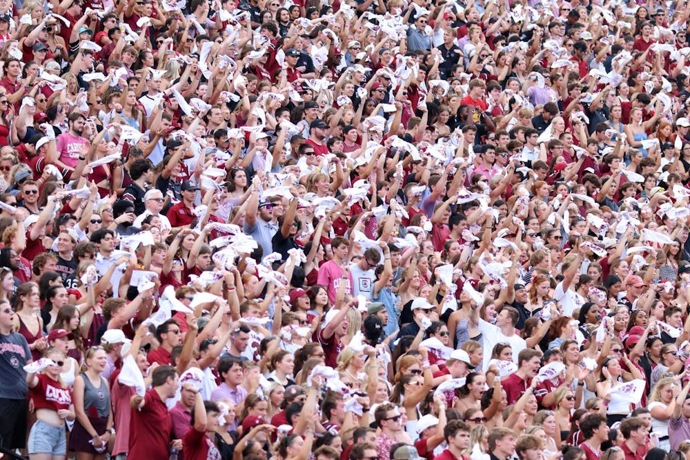 <p>FILE — University of South Carolina students sitting in the student section wave their rally towels at the start of a football game on Aug. 31, 2024. The 2024 season marks 15 years where South Carolina has had its Sandstorm tradition at games.</p>