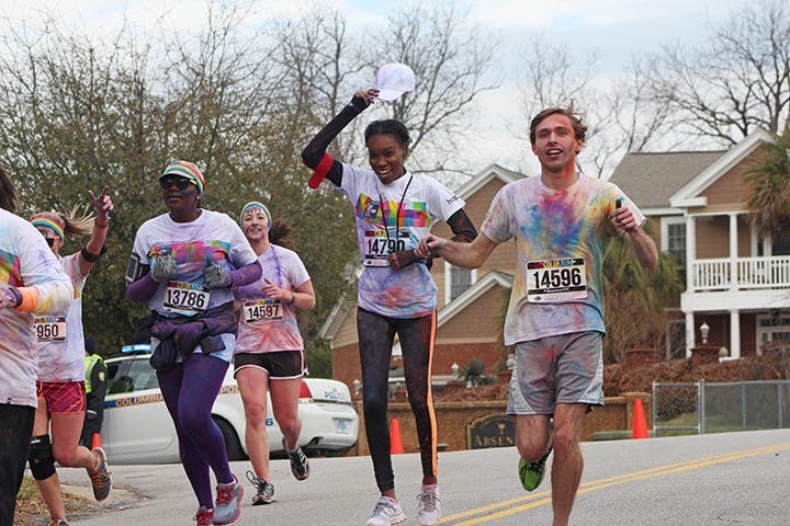 	After being covered in color, runners continue to take on the course of the race.
Heidi Stone/The Daily Gamecock