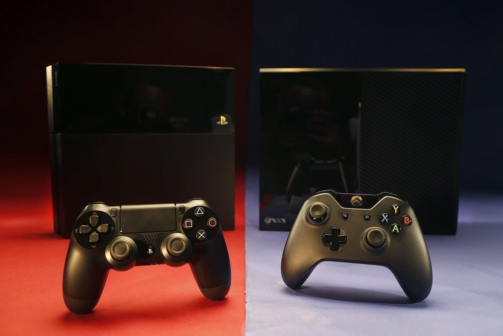 Sony's Playstation 4, left, and Microsoft's XBox One square off for the home video game market this holiday season. (Kirk McKoy/Los Angeles Times/MCT)