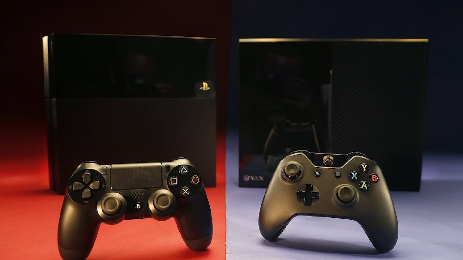 Sony's Playstation 4, left, and Microsoft's XBox One square off for the home video game market this holiday season. (Kirk McKoy/Los Angeles Times/MCT)