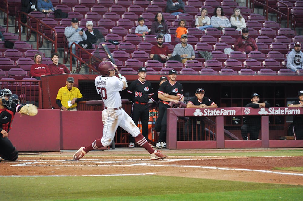 <p>Senior infielder Kevin Madden hits a home run early in the game against Gardiner Webb on Tuesday, March 15, 2022. This home run brings Madden's total up to three home runs this season.</p>