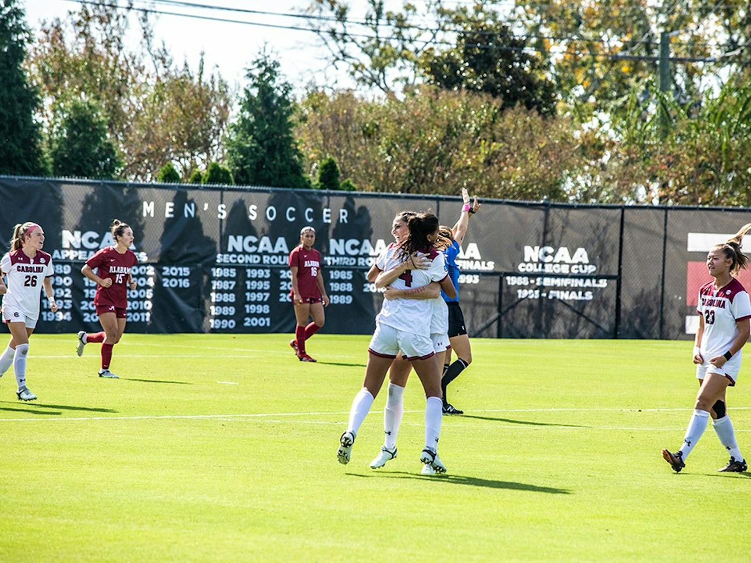 Graduate defender Remi Swartz and graduate forward Ryan Gareis after scoring against Alabama on Oct. 24. The South Carolina women's soccer team won 2-0 against Penn State to reach the Elite Eight in the NCAA Tournament.&nbsp;