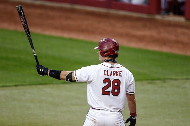 Junior infielder/outfielder Wes Clarke looks at his bat before preparing for the pitch from Davidson's player. South Carolina lost 9-4 against Davidson.