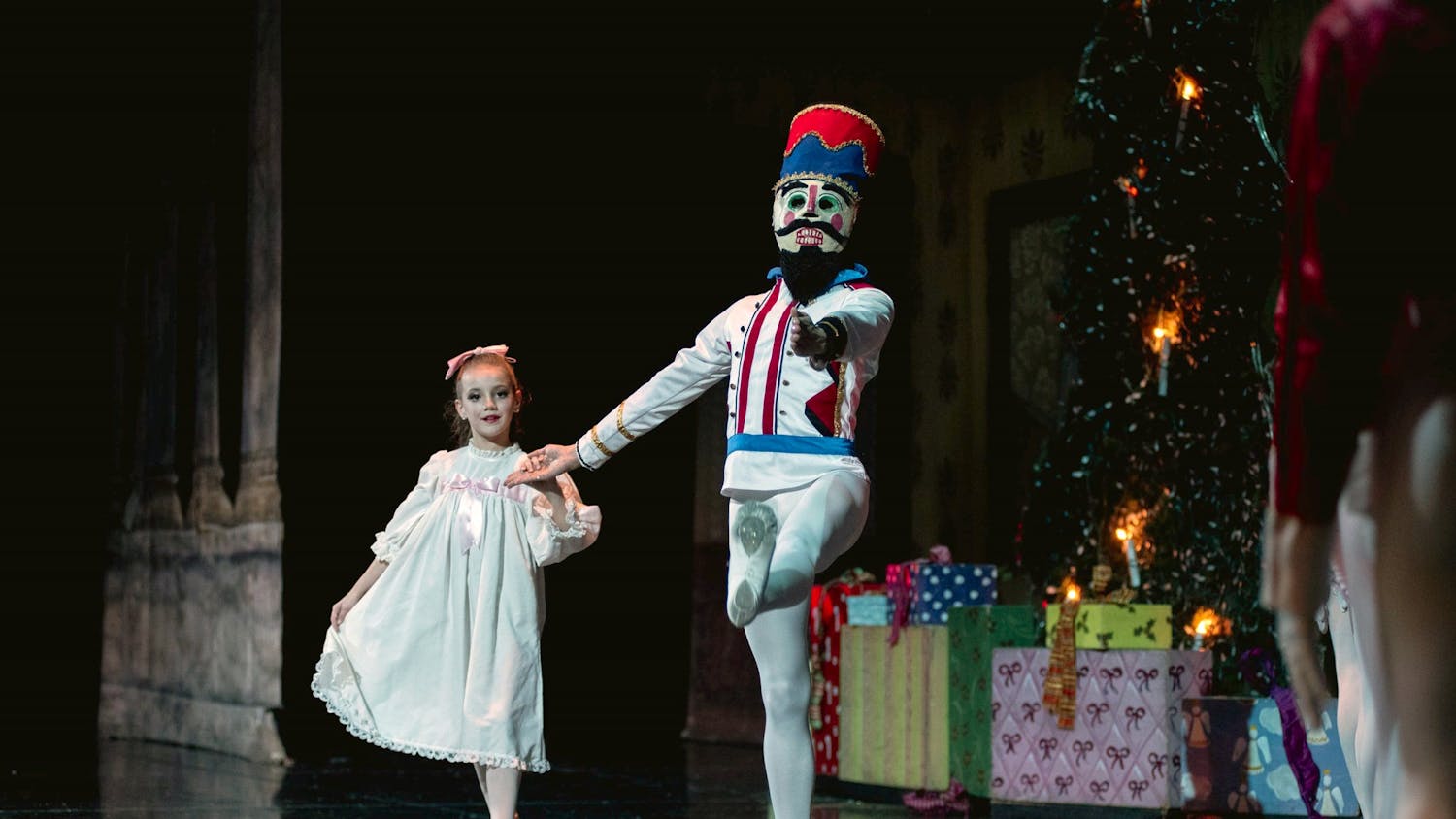 Ava Ramirez, who performs as Clara, and the Nutcracker share a dance in the traditional Christmas ballet.