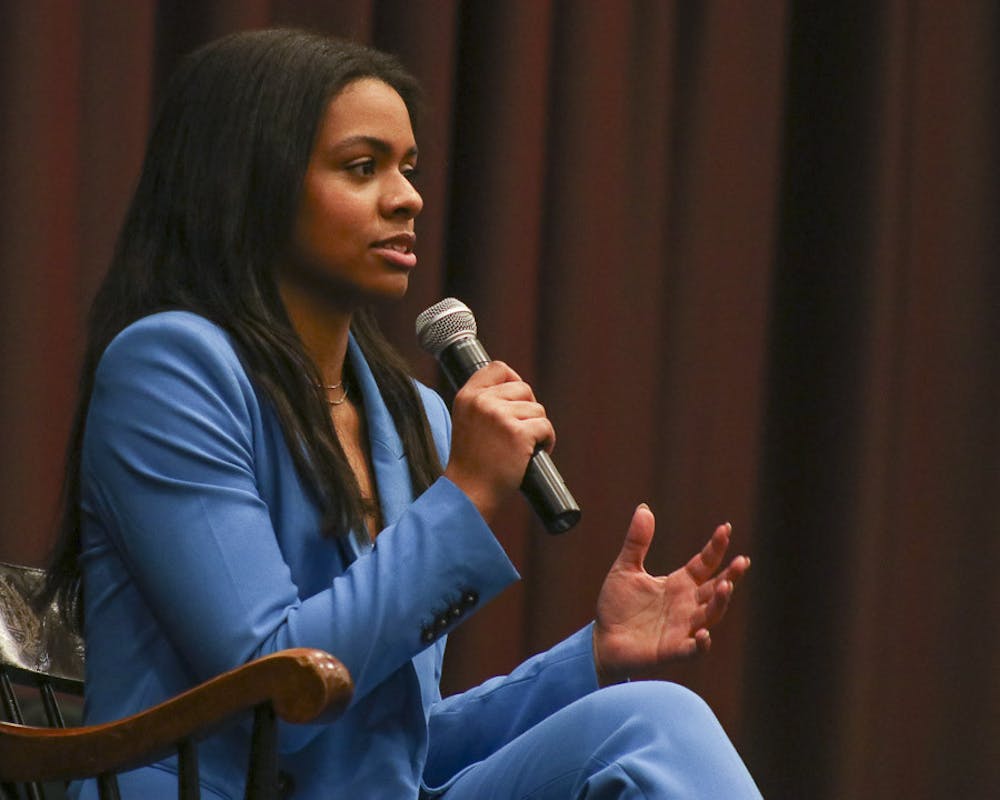 <p>Third-year marketing and finance student Abrianna Reaves gives a speech on stage during the Student Government Executive Debates at the Russell House Ballroom on Feb. 15, 2023. Reaves is running unopposed as vice president of the Student Government Association.</p>