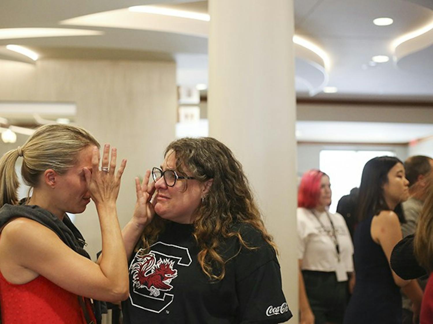 Faculty, protestors cry following the announcement of the selection of Gen. Robert Caslen as the 29th president of the University of South Carolina.&nbsp;