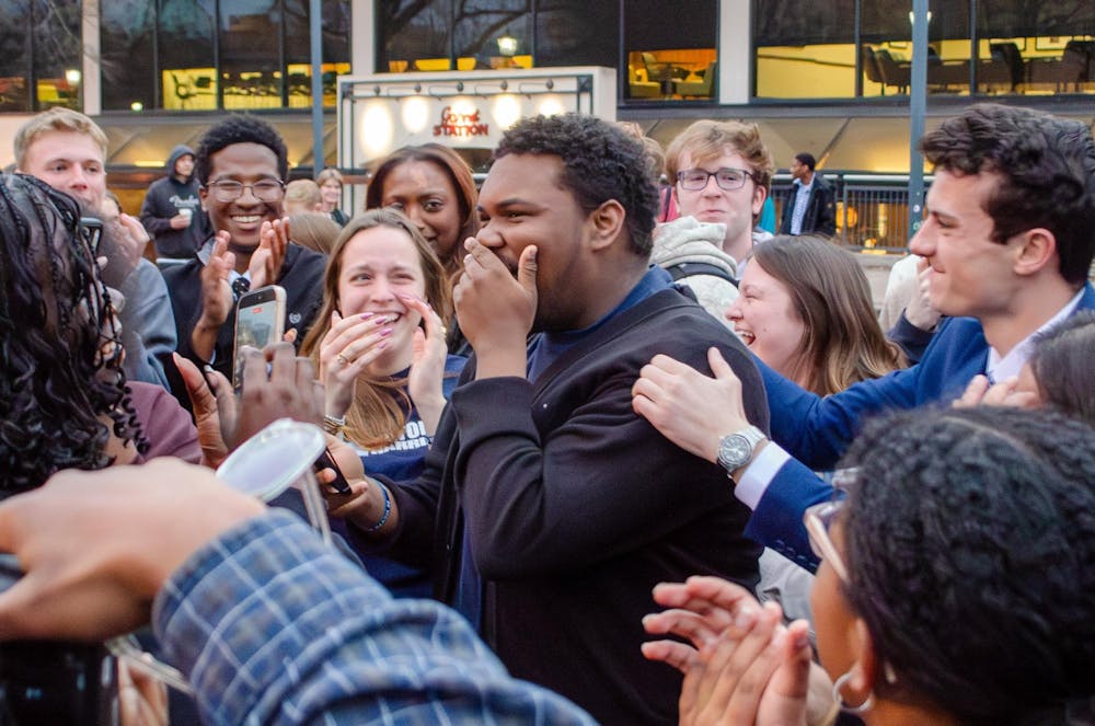 <p>Myron Harris reacts to being elected as student body vice president Feb. 25, 2026. Harris’ running mate, Cole Rotondo, on the right, will compete in a run-off election with Emma Strickland for the position of student body president.</p>