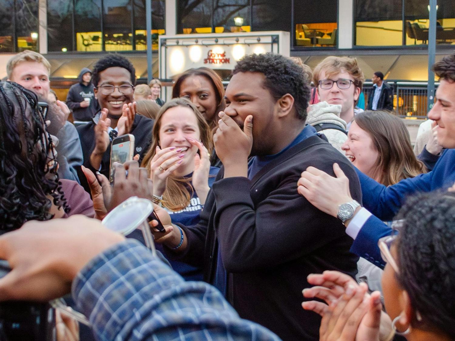 Myron Harris reacts to being elected as student body vice president Feb. 25, 2026. Harris’ running mate, Cole Rotondo, on the right, will compete in a run-off election with Emma Strickland for the position of student body president.
