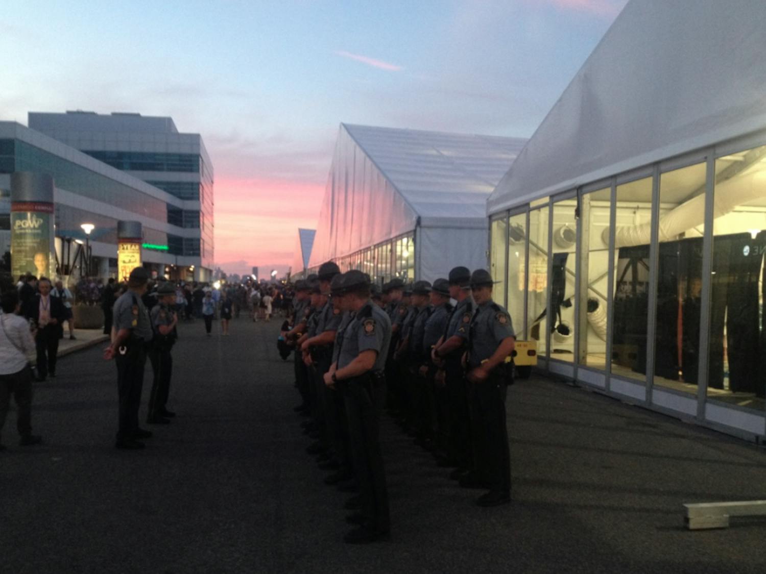Policemen stand guard outside the media center after protests dispersed at the Democratic National Convention in Philadelphia on July 26, 2016.