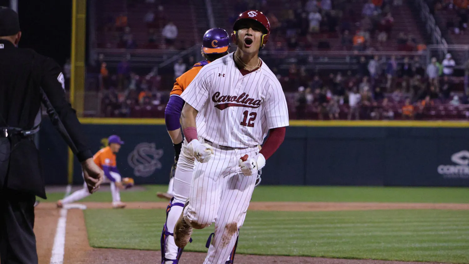 Senior outfielder Ethan Lizama reacts after crossing home plate during the game against Clemson on Feb. 27, 2026, at Founders Park in Columbia, South Carolina. He celebrates after scoring a run for South Carolina.