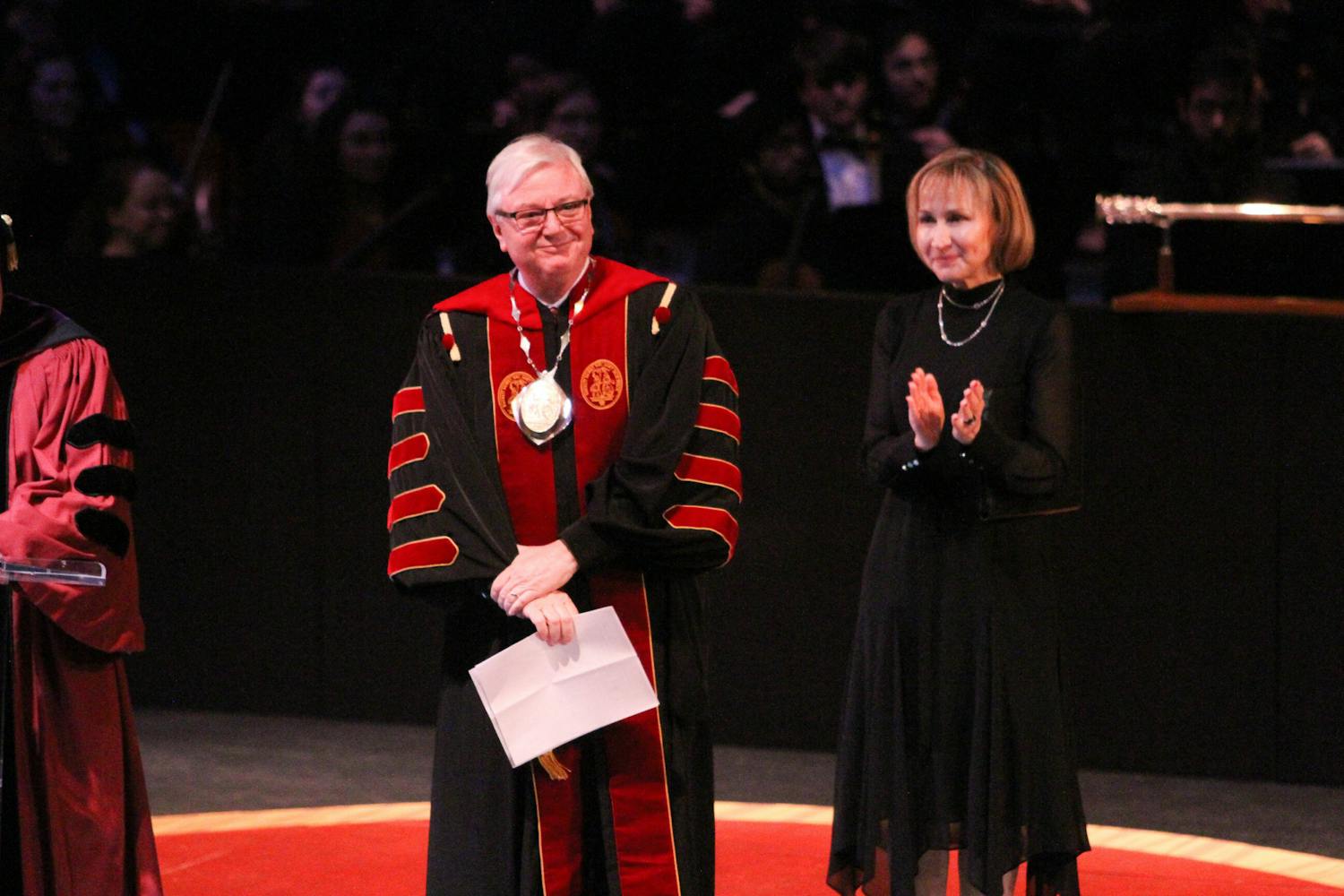President Michael Amiridis, alongside first lady Ero Aggelopoulou-Amiridis, cast smiles toward those in attendance during the Presidential Investiture Ceremony of Amiridis on Jan. 20, 2023, at the Koger Center for the Arts. Amiridis was invested as the University of South Carolina’s 30th president.