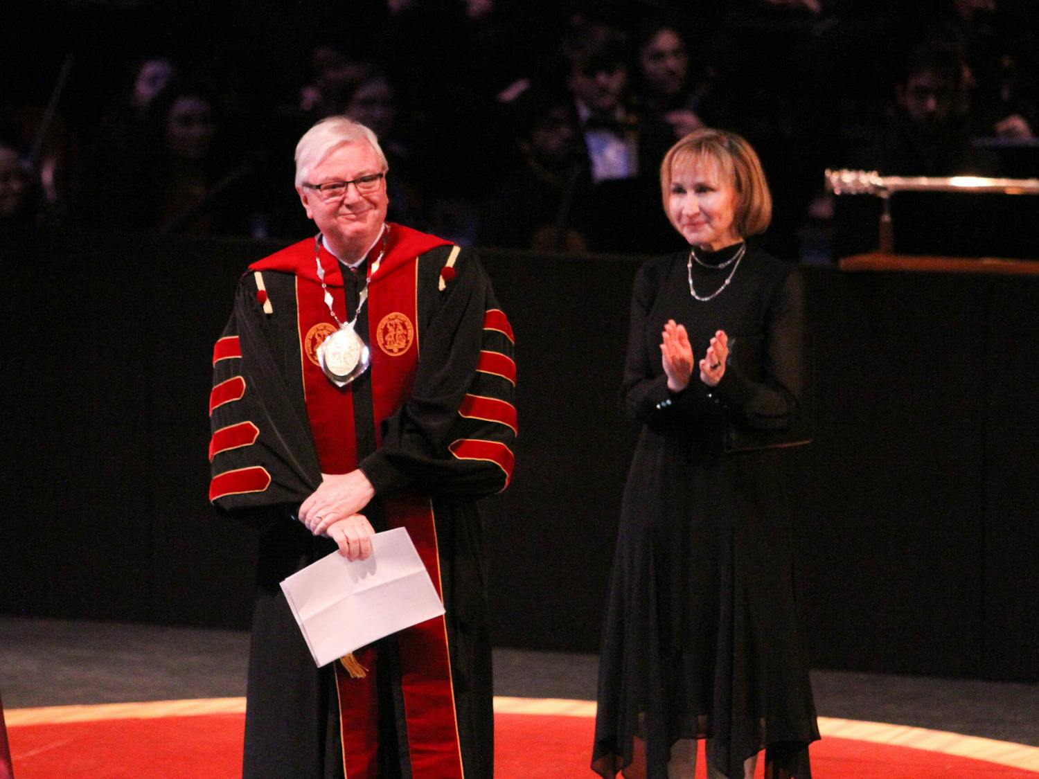 President Michael Amiridis, alongside first lady Ero Aggelopoulou-Amiridis, cast smiles toward those in attendance during the Presidential Investiture Ceremony of Amiridis on Jan. 20, 2023, at the Koger Center for the Arts. Amiridis was invested as the University of South Carolina’s 30th president.