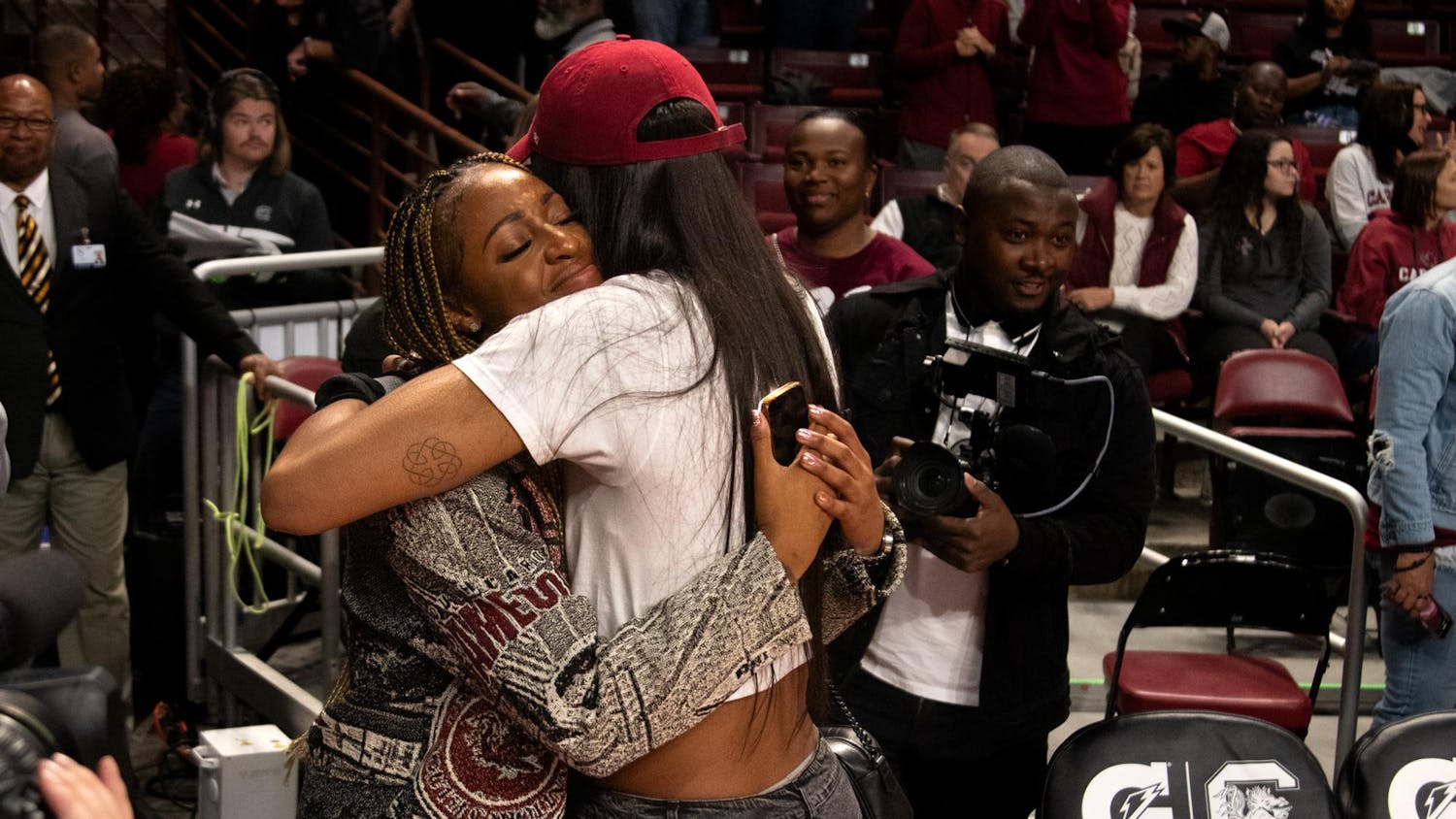 WNBA champion and former Gamecock A'ja Wilson hugs Tiffany Mitchell at Mitchell's jersey retirement ceremony on Nov. 12, 2023. Mitchell's jersey is now hung up in the rafters of Colonial Life Arena.