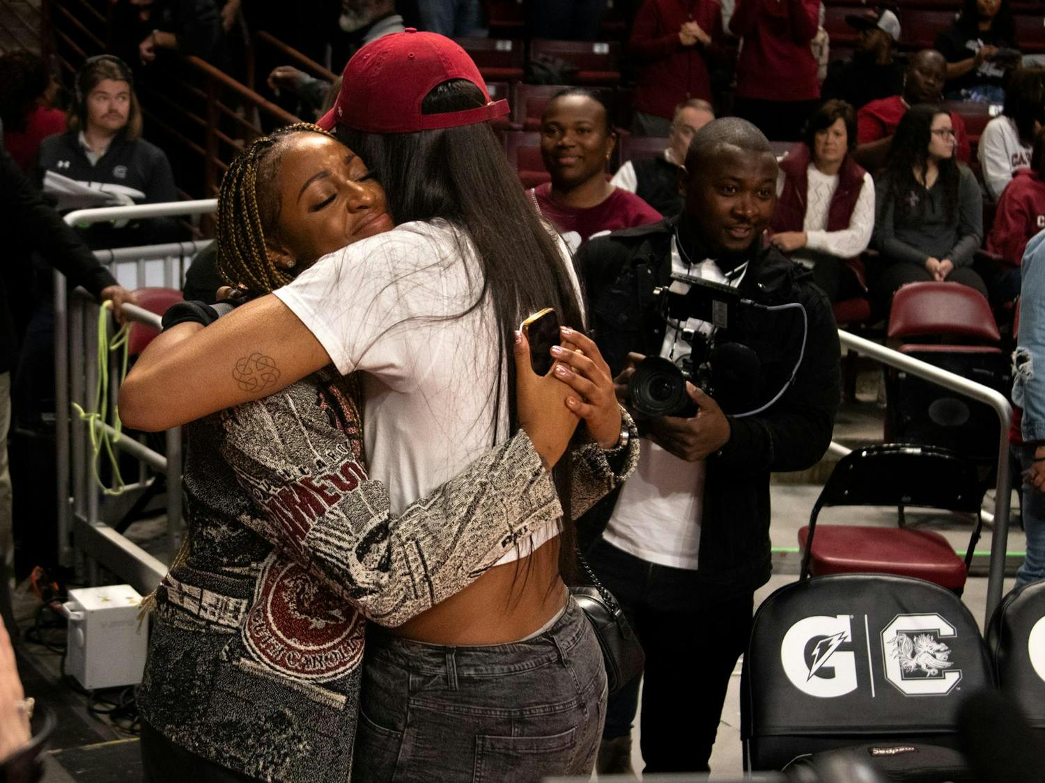 WNBA champion and former Gamecock A'ja Wilson hugs Tiffany Mitchell at Mitchell's jersey retirement ceremony on Nov. 12, 2023. Mitchell's jersey is now hung up in the rafters of Colonial Life Arena.