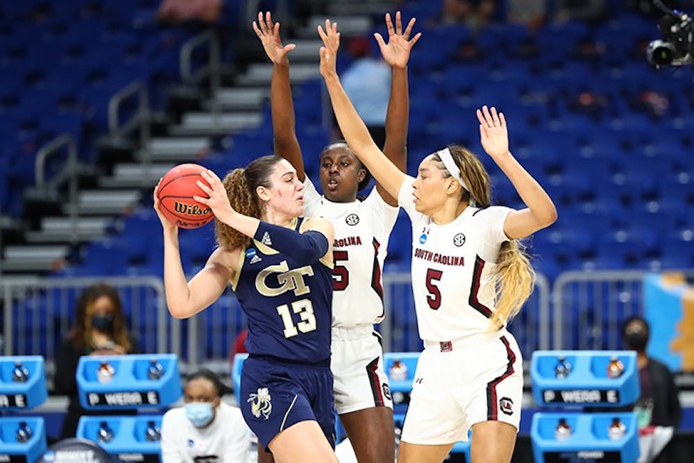 Sophomore forward Laeticia Amihere (15) and Junior forward Victaria Saxton (5) guard a Georgia Tech player in the Gamecocks' win Sunday. The win sends South Carolina to the Elite Eight.
