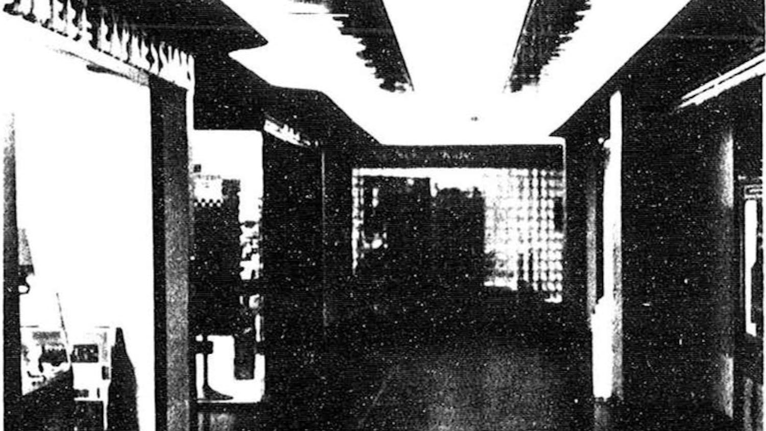 A black and white photo of Russell House's basement in 1985. During the 1980s, Carolina Mall existed in Russell House's basement, carrying shops and dining locations for students.