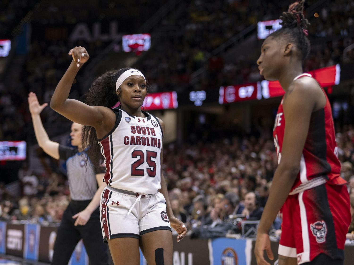 Sophomore guard Raven Johnson stares down former teammate and Wolf Pack junior guard Saniya Rivers after scoring a 3-point shot. Johnson scored 13 points with five assists, helping the Gamecocks advance to the National Championship game.