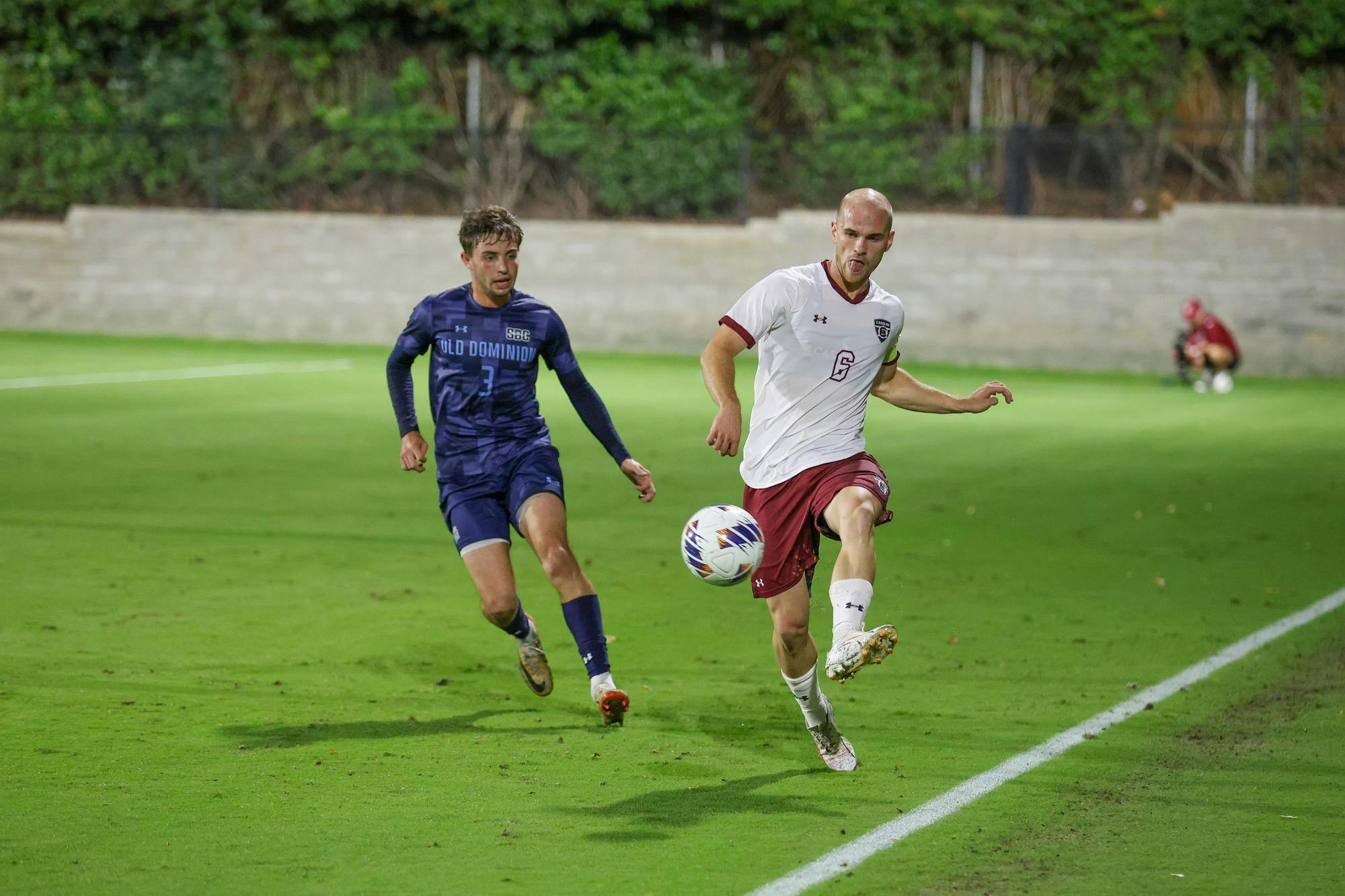Junior midfielder Mika Habel kicks the ball along the sideline during the game against Old Dominion on Oct. 10, 2025. Habel made one shot on the goal and played 60 minutes.