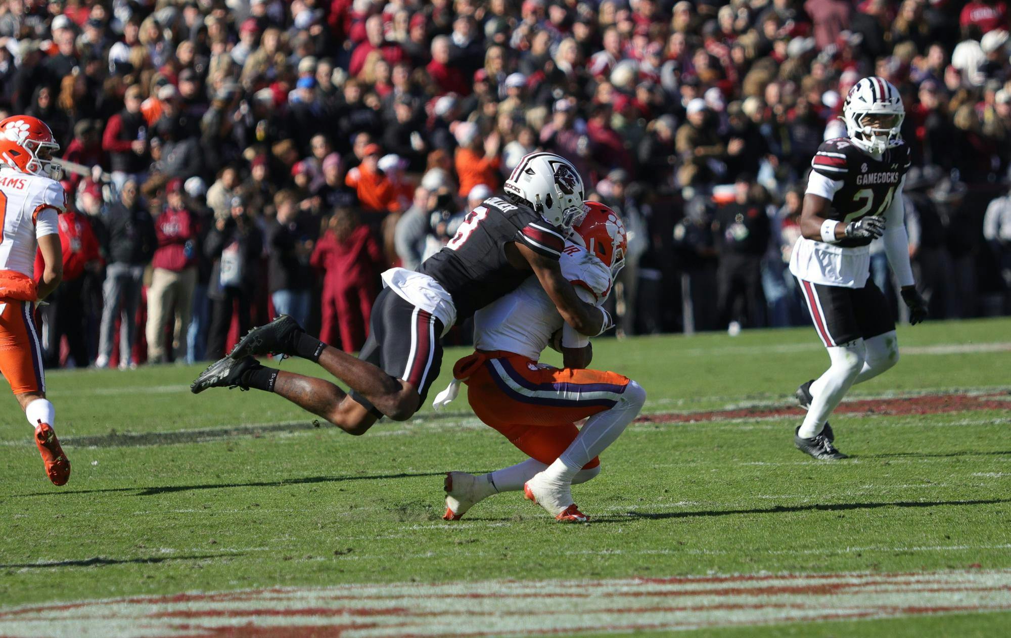 Junior defensive back Judge Collier makes a tackle during South Carolina’s game against Clemson on Nov. 29, 2025, at Williams-Brice Stadium. Collier wraps up the ball carrier as the Gamecocks’ defense works to stop the drive.