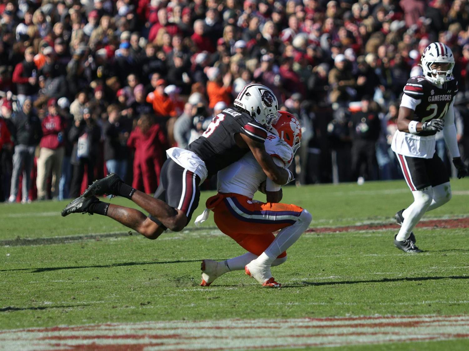 Junior defensive back Judge Collier makes a tackle during South Carolina’s game against Clemson on Nov. 29, 2025, at Williams-Brice Stadium. Collier wraps up the ball carrier as the Gamecocks’ defense works to stop the drive.