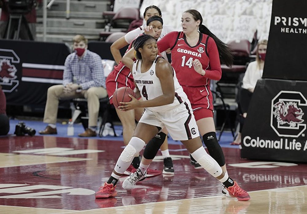 South Carolina Gamecocks forward Aliyah Boston (4) is defended by Georgia Lady Bulldogs center Jenna Staiti (14) at Colonial Life Arena on Thursday, January 21, 2021. 
