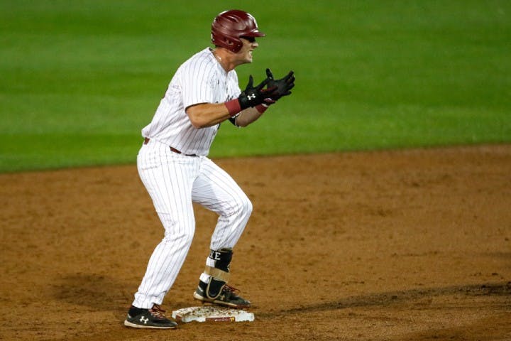 Junior catcher Wes Clarke celebrates after a hit in Saturday's game against Missouri. The Gamecocks won the weekend series against the Tigers.