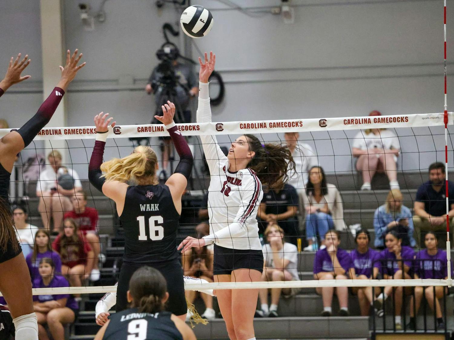 Senior outside hitter Alayna Johnson rises for an attack during South Carolina’s match against Texas A&M at the Carolina Volleyball Center on Wednesday, Oct. 1, 2025. Johnson challenges the block as the Gamecocks push to keep momentum in the rally.