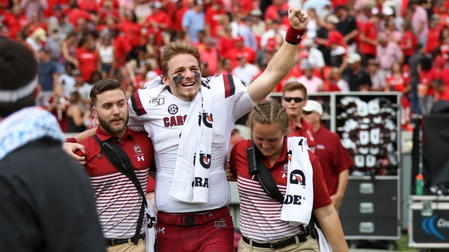 FILE—Former South Carolina quarterback Ryan Hilinski celebrates after South Carolina beat Georgia on Saturday, Oct. 12, 2019 in Athens, GA. This was the first time the Gamecocks beat the Bulldogs since 2014. 