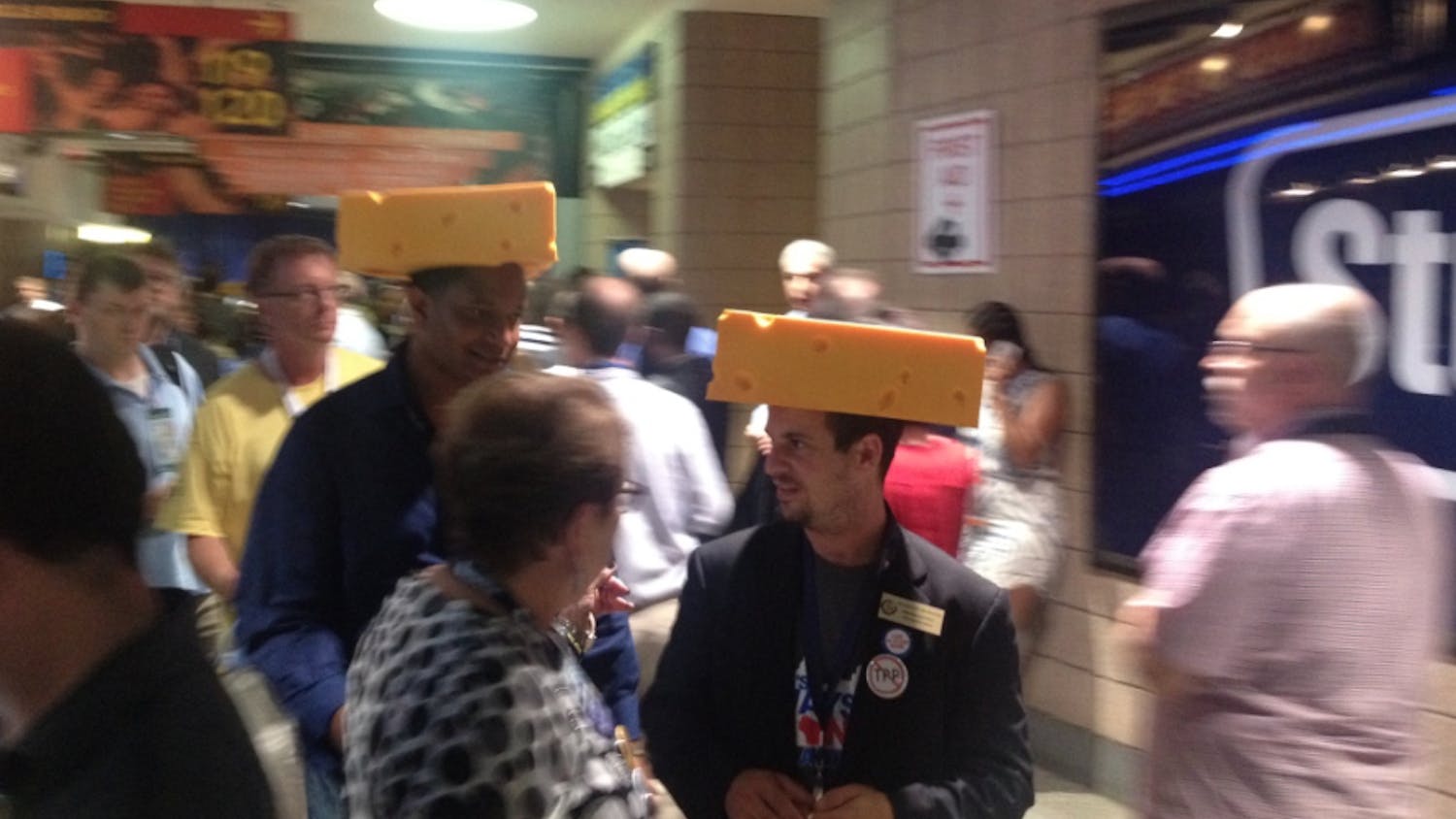 Two delegates from Wisconsin make their way through the crowd at the Democratic National Convention in Philadelphia on July 28, 2016.
