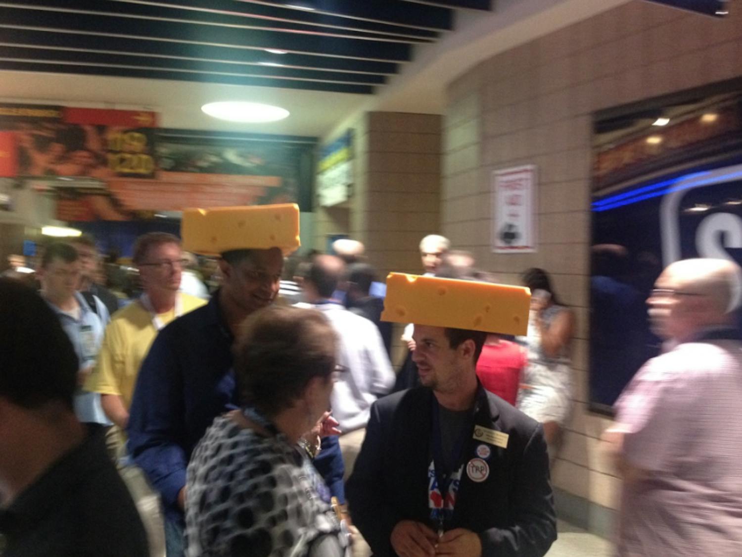 Two delegates from Wisconsin make their way through the crowd at the Democratic National Convention in Philadelphia on July 28, 2016.