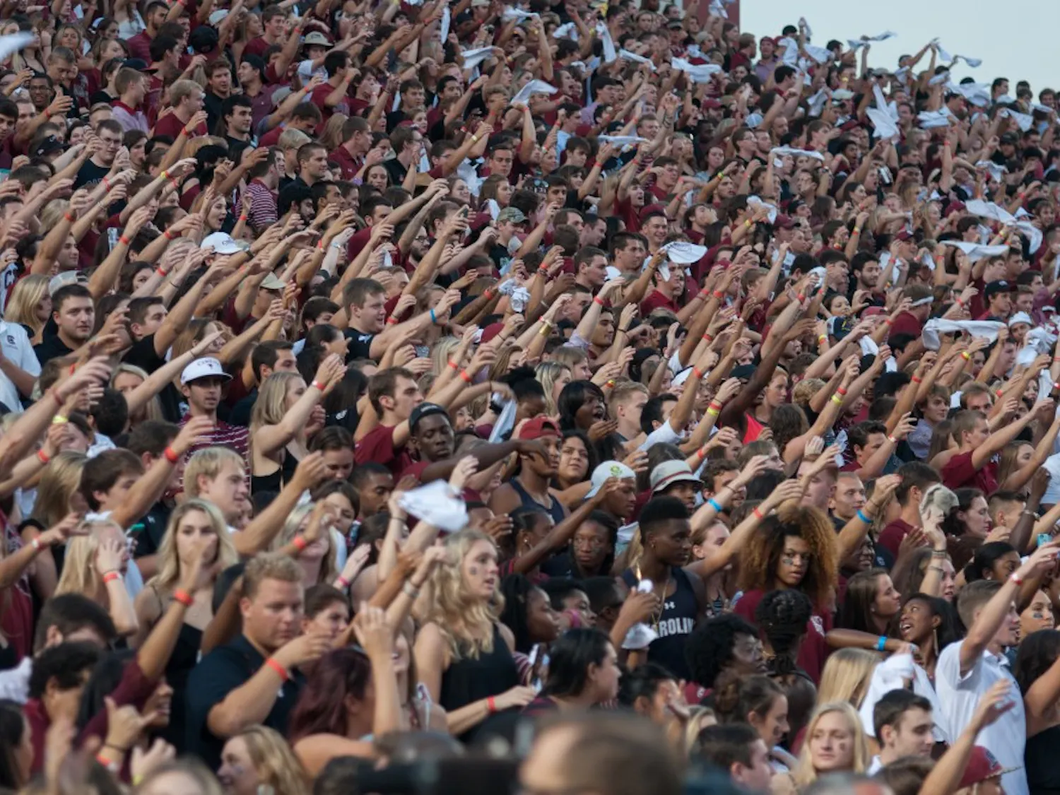 South Carolina fans embrace gameday traditions, such as toasting during the alma mater at the conclusion of games. 