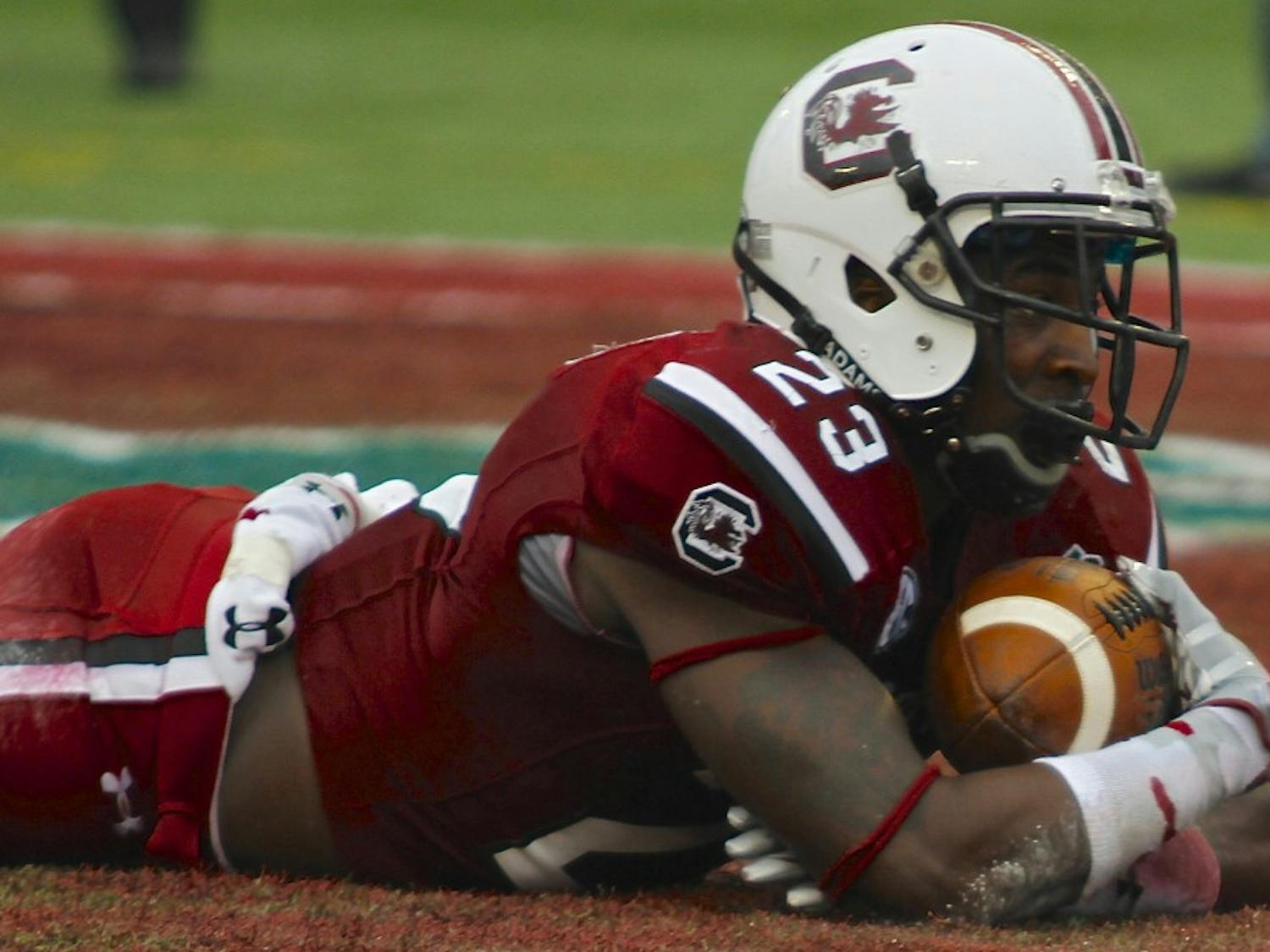 	Junior wide receiver Bruce Ellington clutches one of his two touchdowns on the day, propelling South Carolina to a 34-24 victory over Wisconsin in the 2014 Capital One Bowl.