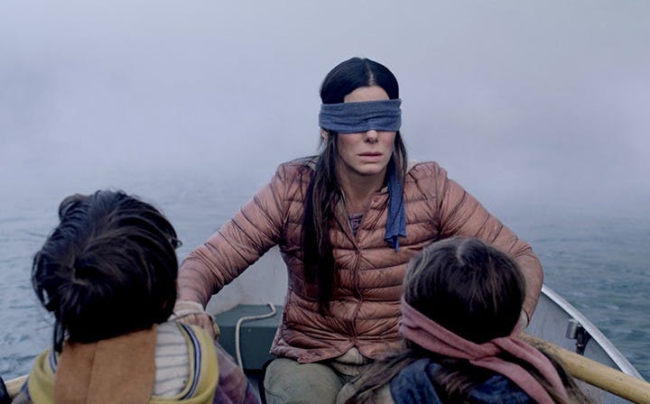 Julian Edwards, Sandra Bullock and Vivien Lyra Blair play Boy, Malorie, and Girl in the Movie "Bird Box." "Bird Box" debuted Dec. 14, 2018.