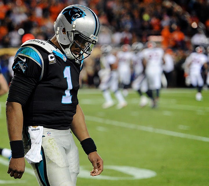 Carolina Panthers quarterback Cam Newton walks off the field after being knocked down in the end zone during fourth-quarter action against the Denver Broncos in Super Bowl 50 at Levi&apos;s Stadium in Santa Clara, Calif., on Sunday, Feb. 7, 2016. The Broncos won, 24-10. (Jeff Siner/Charlotte Observer/TNS)