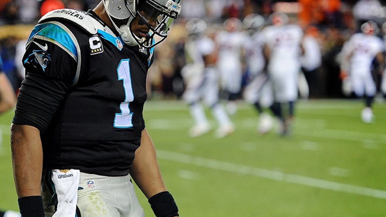 Carolina Panthers quarterback Cam Newton walks off the field after being knocked down in the end zone during fourth-quarter action against the Denver Broncos in Super Bowl 50 at Levi's Stadium in Santa Clara, Calif., on Sunday, Feb. 7, 2016. The Broncos won, 24-10. (Jeff Siner/Charlotte Observer/TNS)
