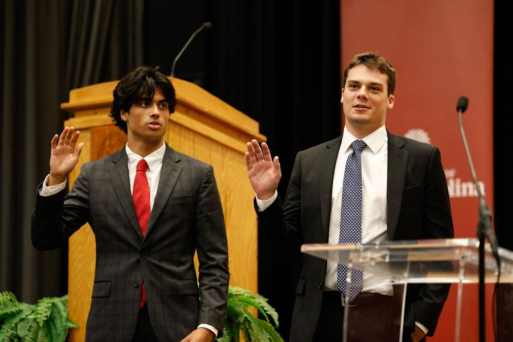 <p>New senators Lucas Solomon and Thomas Spurgeon are sworn into office at the student senate meeting at Russell House Theater on Nov. 6, 2024. Both senators will serve on the Sustainability Committee.</p>